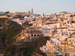 View of Fira Santorini, while the sun is going down.