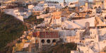 Fira, Santorini island View of Fira Santorini, while the sun is going down.