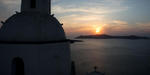 Sunset, Caldera, Fira city A church in Fira and the beautiful sunset