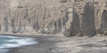 Vlichada beach in Santorini. Magnificent rocks lying behind the beach 